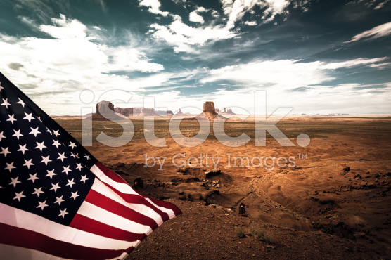 stock-photo-41351442-wild-west-monument-valley-landscape-with-american-flag-usa-landmark-jpg.252314